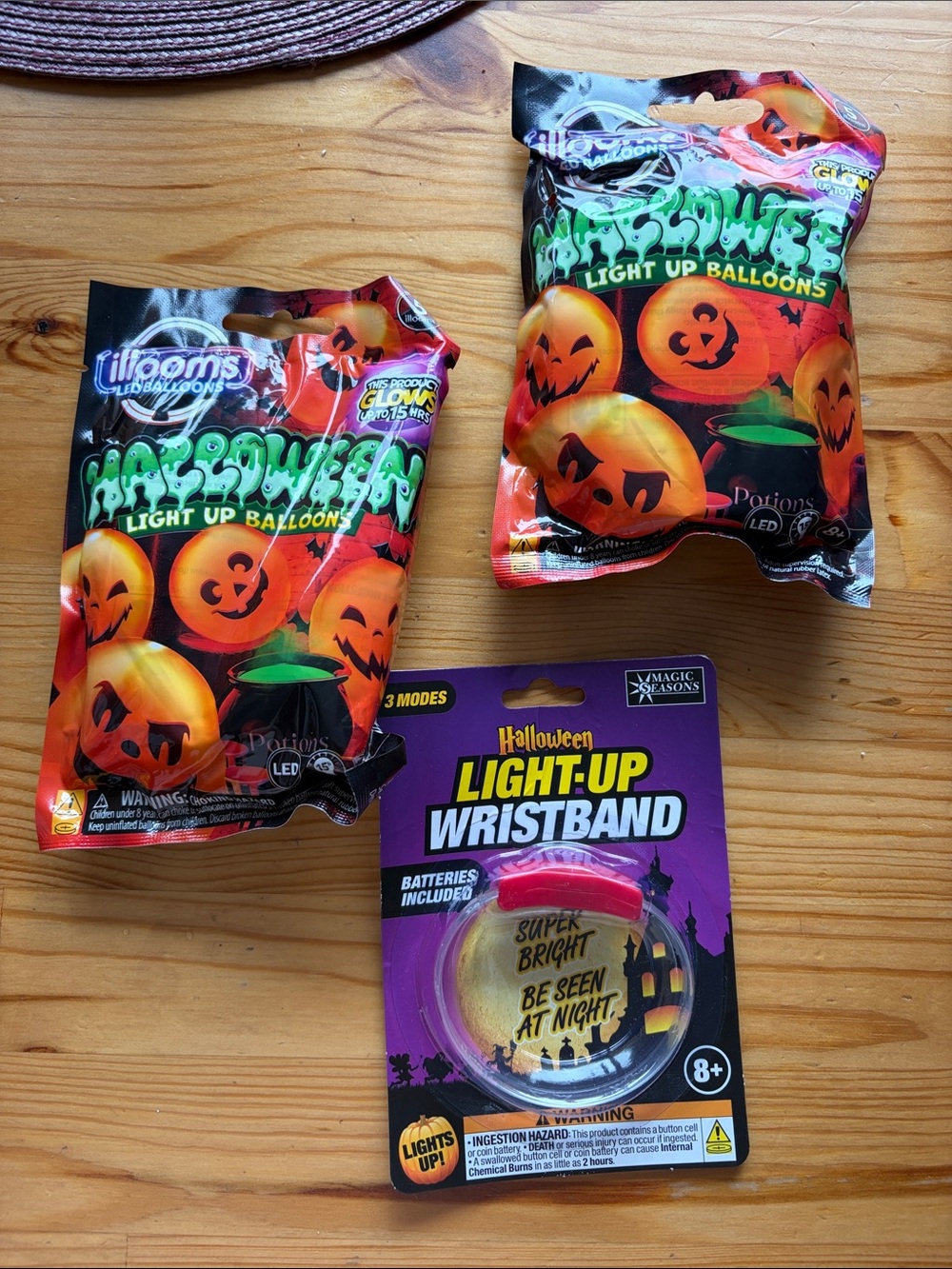 Bundle is Halloween Light-Up Wristband 2 and Orange Halloween Light-Up Ballon